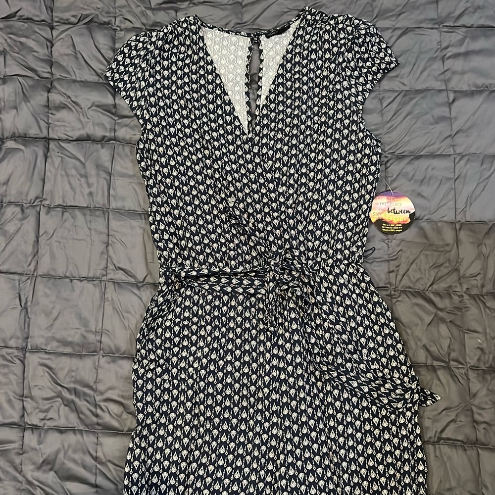 Jump suit. never worn. size large. tag attached.